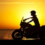 Biker riding during sunset